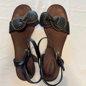 See by Chloe flat sandals with studded bow.